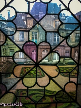 museum of history paris musee carnavalet stained glass window garden